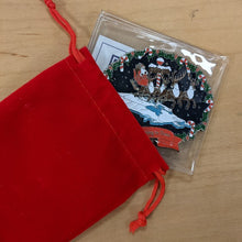 RCMP Christmas coin in red velvet bag
