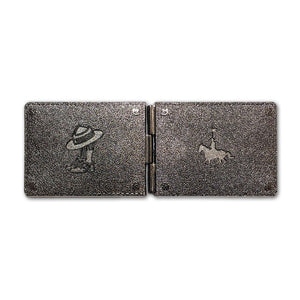 RCMP wallet coin open flat from the back showing the horse and rider and the boots and hat  that appear to be embossed into the leather. 