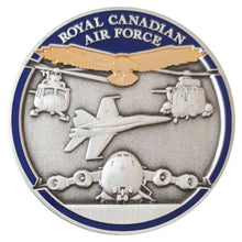 Opposite side of Royal Canadian Air Force coin with 3D antique silver jet, airplane and two helicopters as well as a polished gold eagle and a blue border