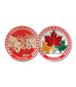 Both sides of Canada Caribou Non-Trackable coin featured.  One has two caribou butting heads with a red background and border.  The opposite has three maple leaves in orange, red and green with a red border.