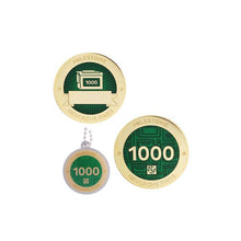 Milestone geocoin in gold with dark green paint for your 1000th find.  Front and back pictured, as well as the matching tag.