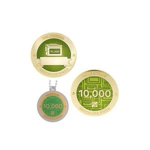 Milestone geocoin in gold with light green paint for your 10000th find.  Front and back pictured, as well as the matching tag.