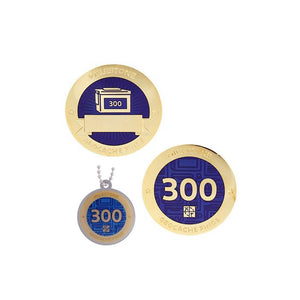 Milestone geocoin in gold with indigo paint for your 300th find.  Front and back pictured, as well as the matching tag.