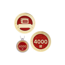 Milestone geocoin in gold with red paint for your 4000th find.  Front and back pictured, as well as the matching tag.