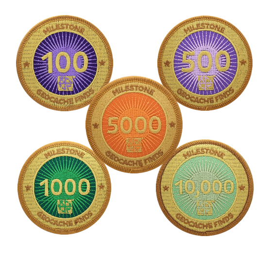 Image of 5 patches with a gold background and multiple colours behind different milestone finds.  Quantities are 100, 500, 1000, 5000 and 10000.