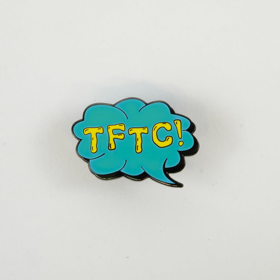 Turquoise glow in the dark TFTC pin