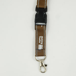 Close up of black clip on brown lanyard and lobster claw 