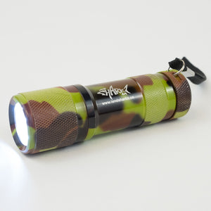 Camouflage print flashlight with the Sharkz logo and the light on