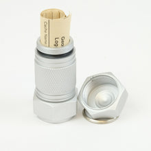 Silver mighty-mini aluminum cache with logbook rolled up inside it