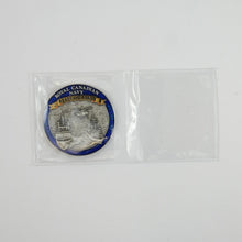 PVC pouch open with a Navy challenge coin on the left side