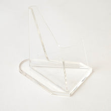 Close up of transparent acrylic coin stand