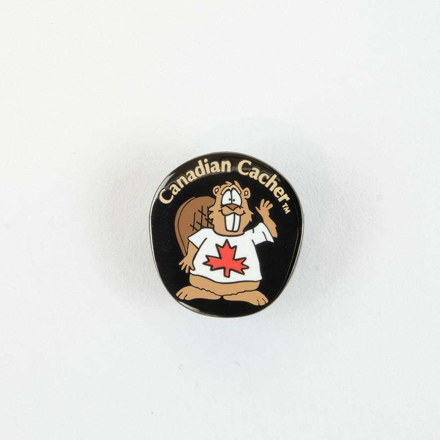 Small black enamel pin with the Canadian Cacher Beaver Dude cartoon on the front