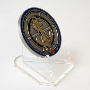 Acrylic coin stand holding a challenge coin